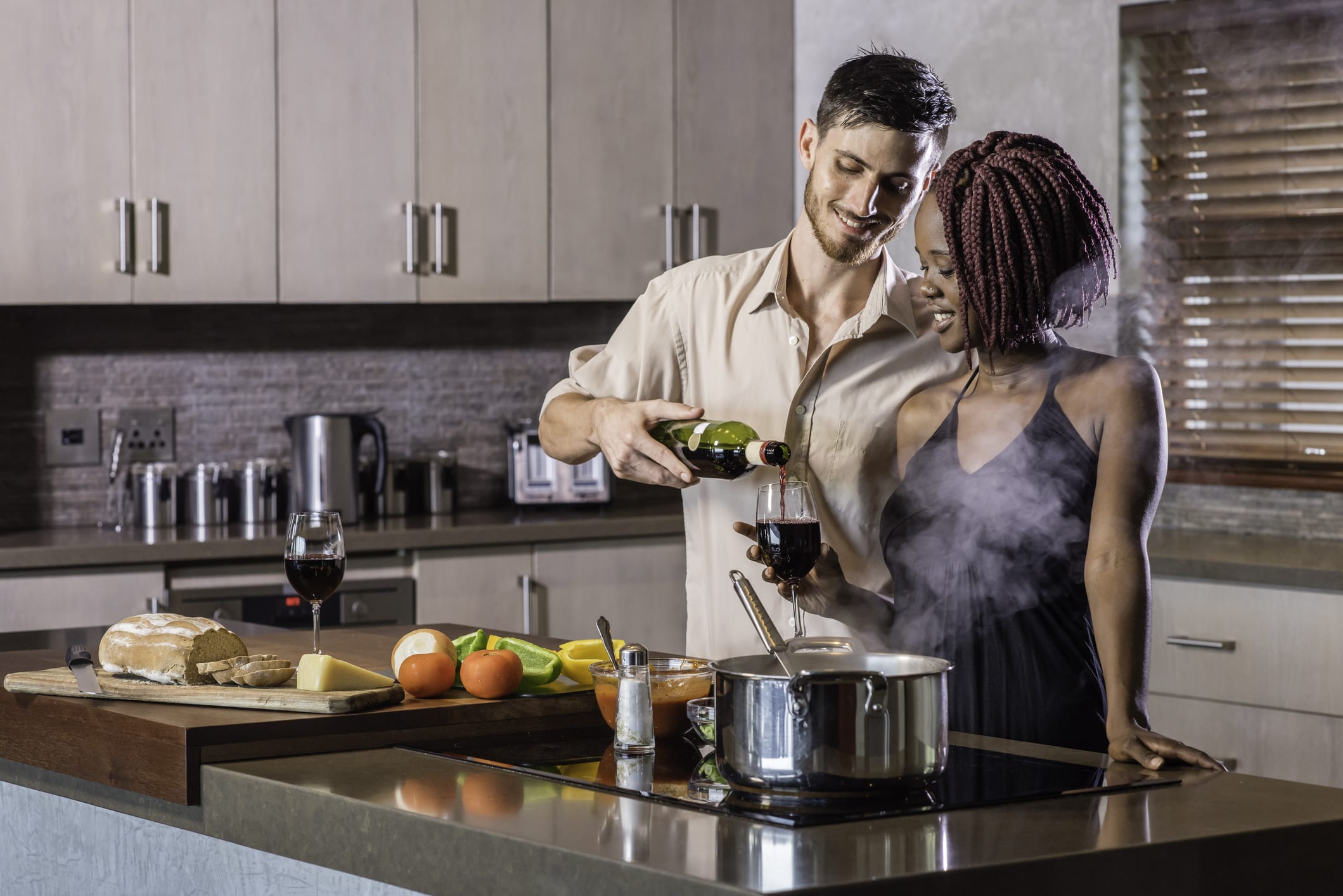 newly remodeled kitchen with happy couple